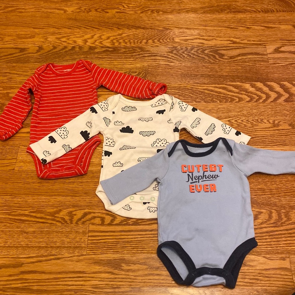 Three cute body suits
